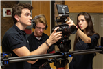 Ian, Ethan and Kaydee work with the RED camera on a slider